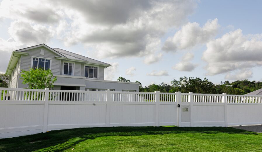 Queensland Fencing Specialists premium white PVC privacy fencing installed at a Queensland home