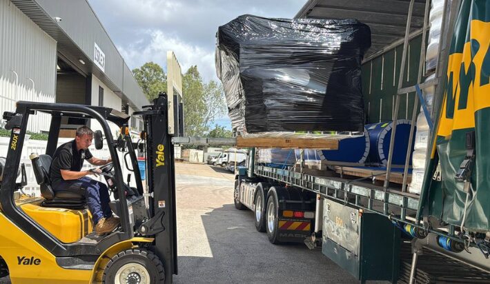 Queensland Fencing Specialists team handling fencing materials delivery and logistics in Queensland